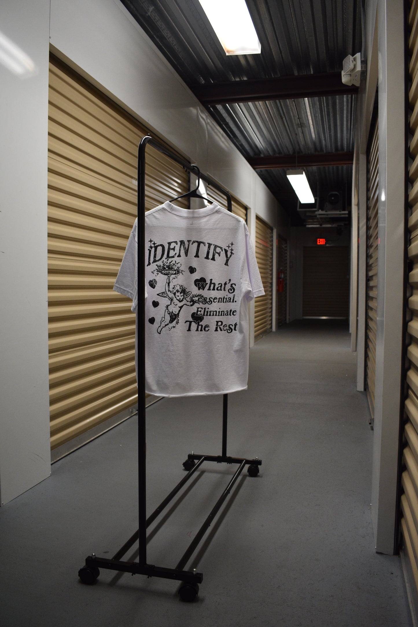 10: Identify Whats Essential Eliminate The Rest T-Shirt (WHITE)